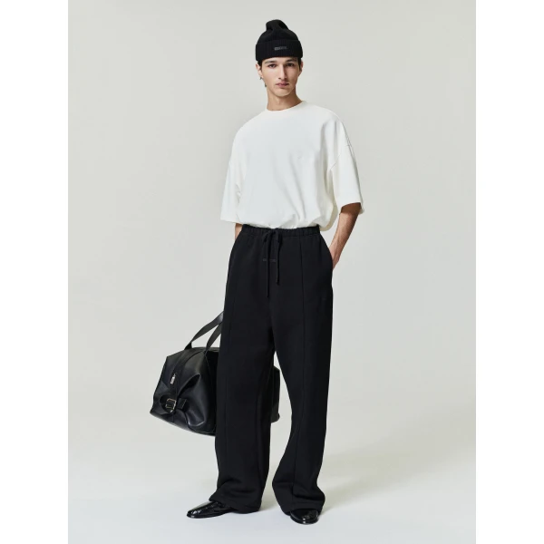 Fear of God Essentials Pique Signature 90s Tee in Ivory | T-shirts & vests | Coveti