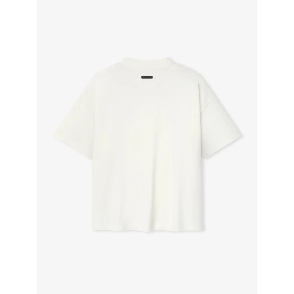 Fear of God Essentials Pique Signature 90s Tee in Ivory | T-shirts & vests | Coveti