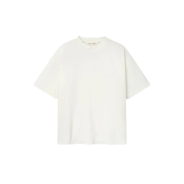 Fear of God Essentials Pique Signature 90s Tee in Ivory | Coveti