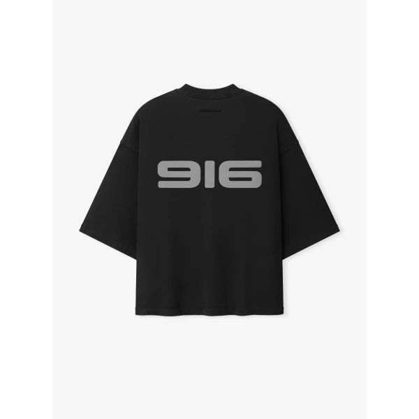 Fear of God Essentials Racing Merch Tee in Washed Vintage Black | T-shirts & vests | Coveti
