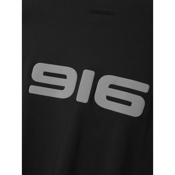 Fear of God Essentials Racing Merch Tee in Washed Vintage Black | T-shirts & vests | Coveti
