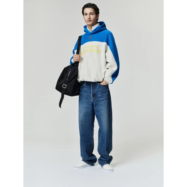 Fear of God Essentials Rams 90s Relaxed Hoodie in Vanilla Heather | Sweatshirts | Coveti