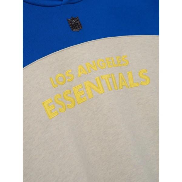 Fear of God Essentials Rams 90s Relaxed Hoodie in Vanilla Heather | Sweatshirts | Coveti