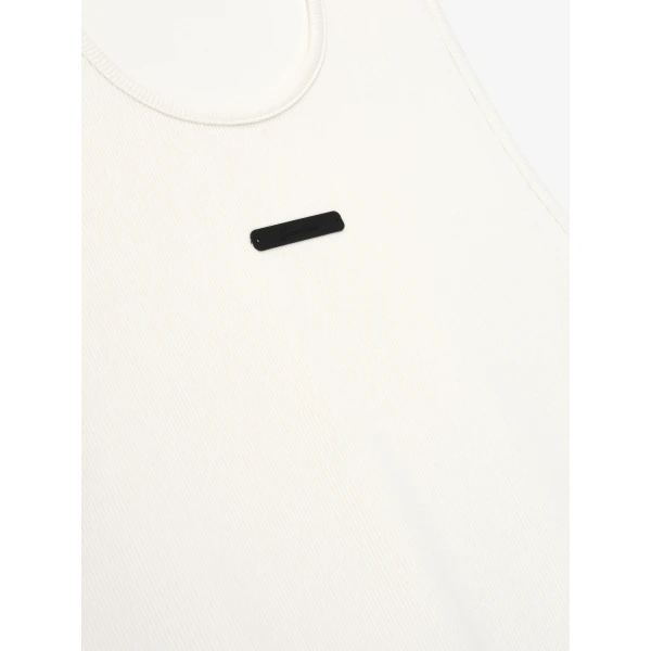 Fear of God Essentials Rib Tank in Ivory | T-shirts & vests | Coveti