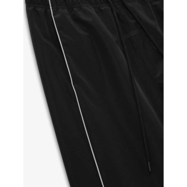Fear of God Essentials Ripstop Classic Track Pant in Black | Pants | Coveti
