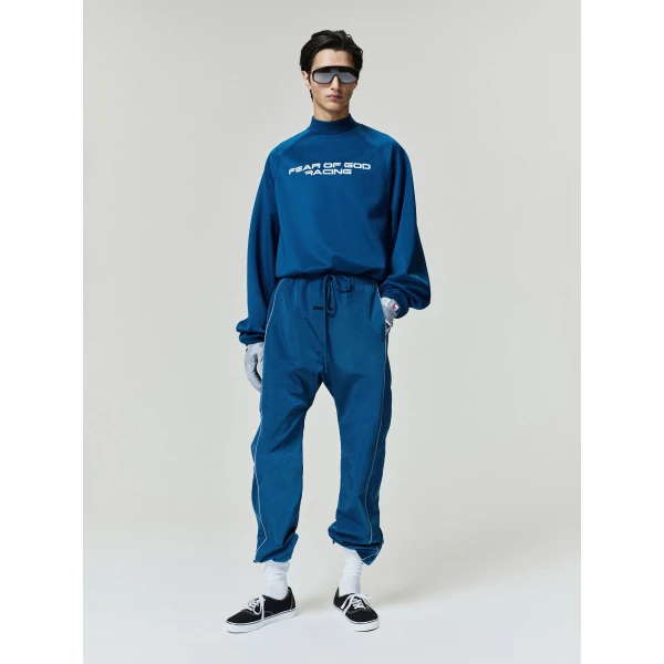 Fear of God Essentials Ripstop Classic Track Pant in Night Sea | Pants | Coveti