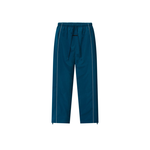 Fear of God Essentials Ripstop Classic Track Pant in Night Sea | Coveti