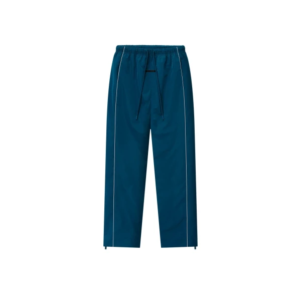 Fear of God Essentials Ripstop Classic Track Pant in Night Sea | Coveti