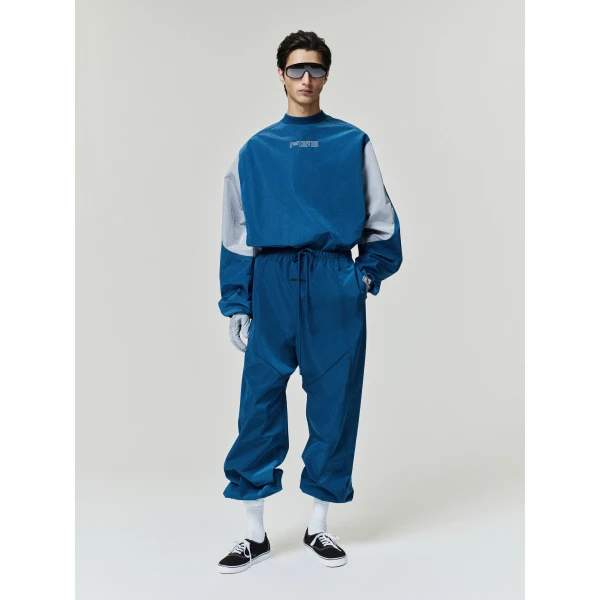 Fear of God Essentials Ripstop Modern Mockneck Pullover in Night Sea | Sweatshirts | Coveti