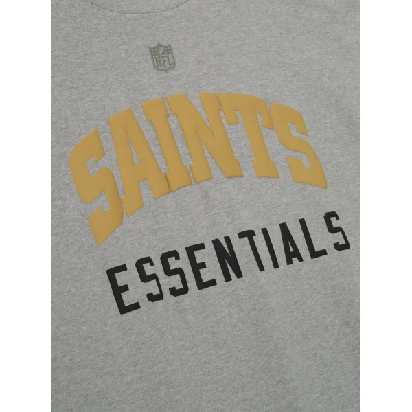 Fear of God Essentials Saints 90s 3/4 Sleeve Football Tee in Concrete Heather | T-shirts & vests | Coveti