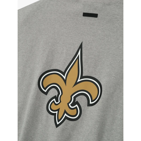 Fear of God Essentials Saints 90s 3/4 Sleeve Football Tee in Concrete Heather | T-shirts & vests | Coveti