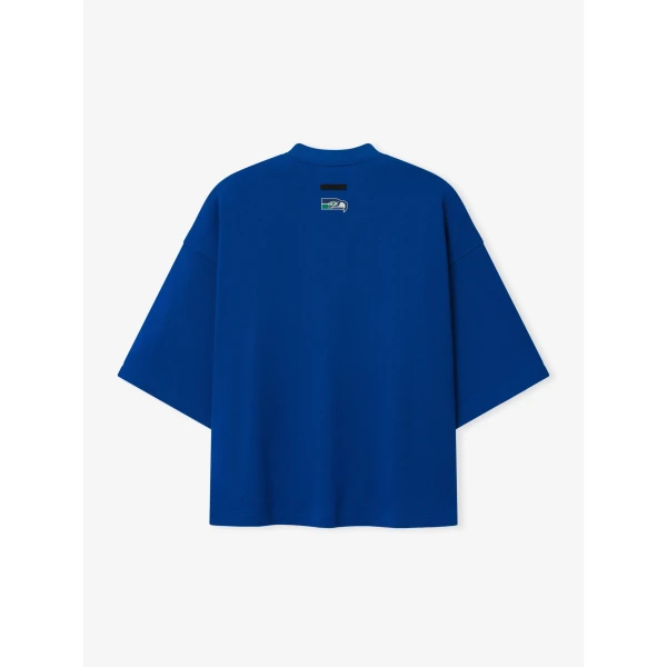 Fear of God Essentials Seahawks Merch Tee in Blue | T-shirts & vests | Coveti