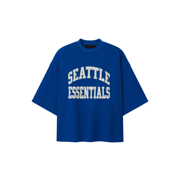 Fear of God Essentials Seahawks Merch Tee in Blue | Coveti