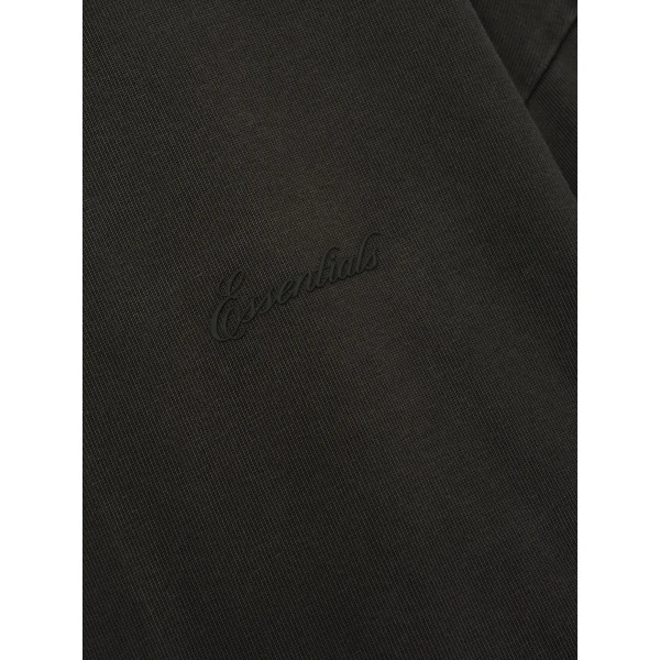 Fear of God Essentials Signature 90s Relaxed Long Sleeve Tee in Washed Ink Black | T-shirts & vests | Coveti
