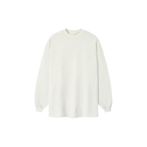 Fear of God Essentials Signature 90s Relaxed Long Sleeve Tee in Washed Ivory | Coveti