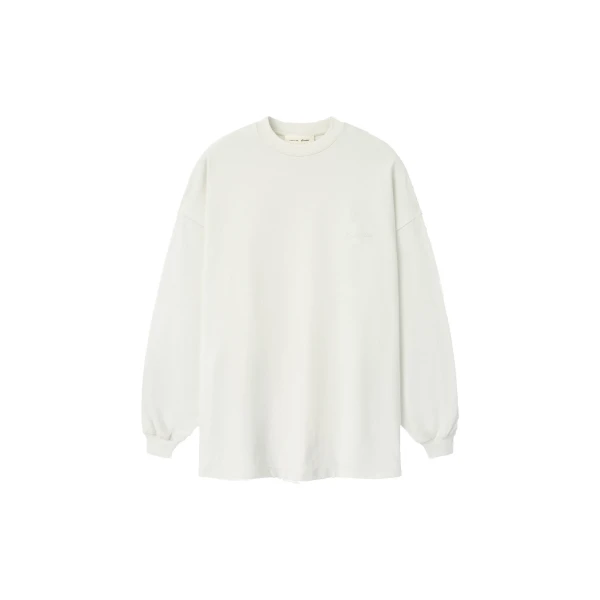 Fear of God Essentials Signature 90s Relaxed Long Sleeve Tee in Washed Ivory | Coveti