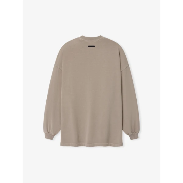 Fear of God Essentials Signature 90s Relaxed Long Sleeve Tee in Washed Stone | T-shirts & vests | Coveti