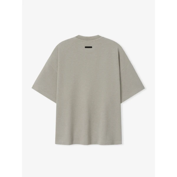 Fear of God Essentials Signature 90s Relaxed Tee in Pyrite Heather | T-shirts & vests | Coveti