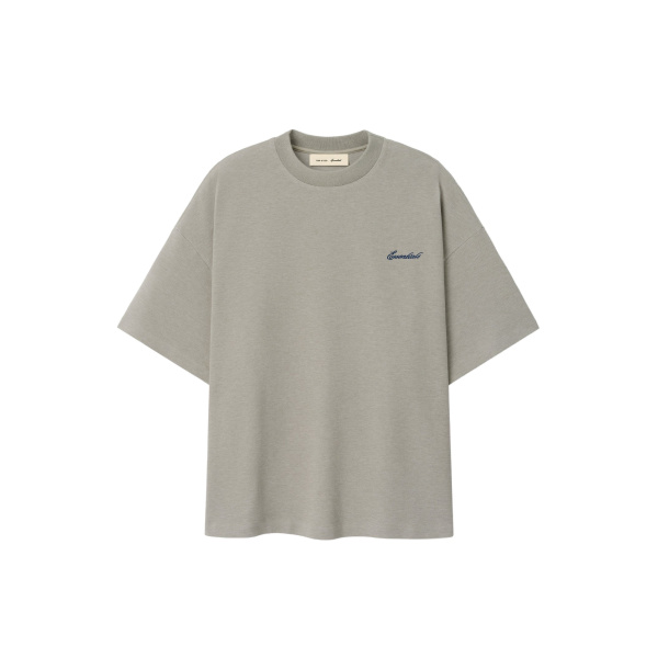 Fear of God Essentials Signature 90s Relaxed Tee in Pyrite Heather | Coveti