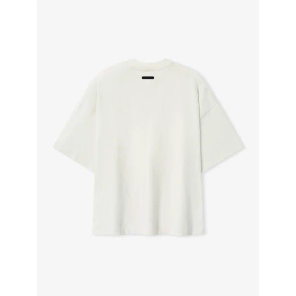 Fear of God Essentials Signature 90s Relaxed Tee in Washed Ivory | T-shirts & vests | Coveti