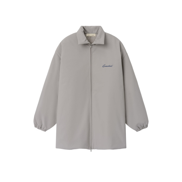 Fear of God Essentials Signature Bonded Nylon Filled Barn Jacket in Stone | Coveti
