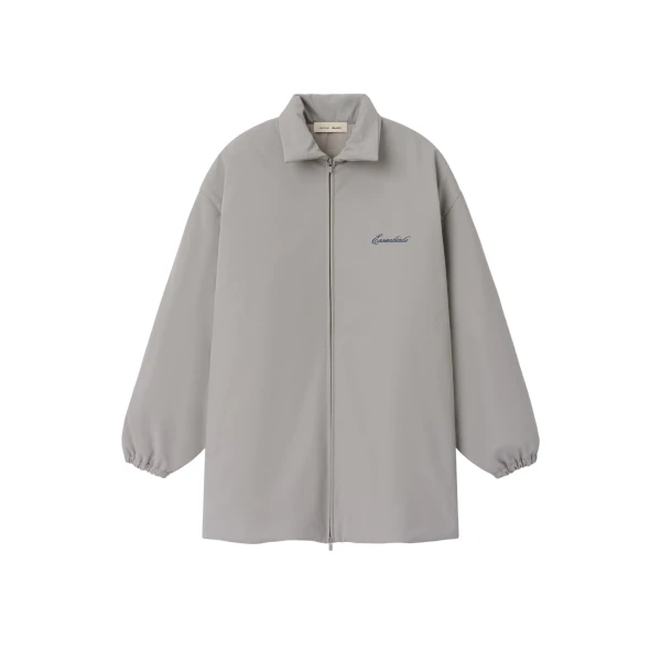 Fear of God Essentials Signature Bonded Nylon Filled Barn Jacket in Stone | Coveti