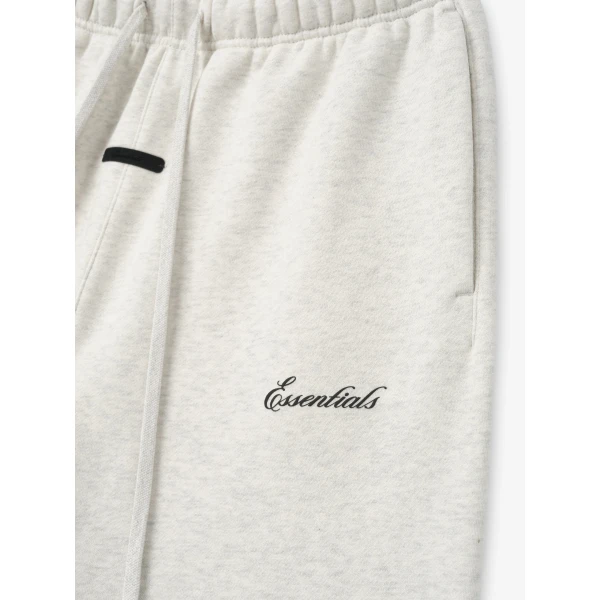Fear of God Essentials Signature Classic Sweatpant in Oatmeal Heather | Pants | Coveti