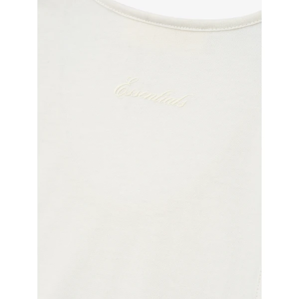 Fear of God Essentials Signature Essential Tank in Ivory | T-shirts & vests | Coveti