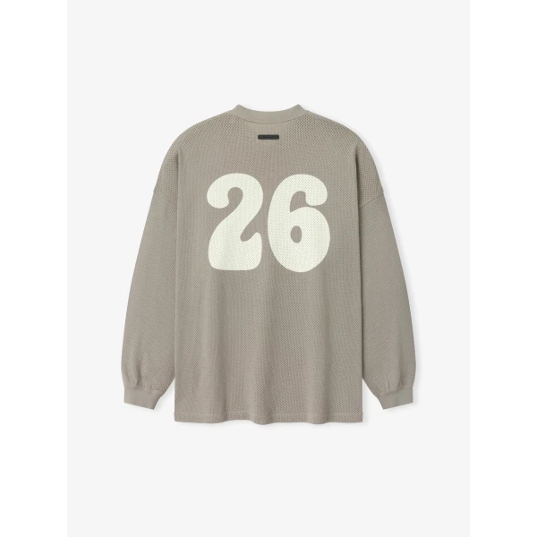 Fear of God Essentials Sport Mesh Merch Long Sleeve Tee in Seal | T-shirts & vests | Coveti