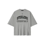 Fear of God Essentials Steelers 90s 3/4 Sleeve Football Tee in Concrete Heather | Coveti