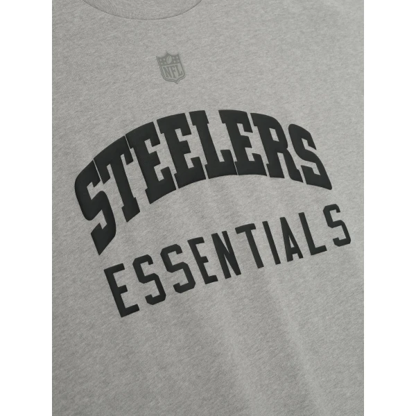 Fear of God Essentials Steelers 90s 3/4 Sleeve Football Tee in Concrete Heather | T-shirts & vests | Coveti