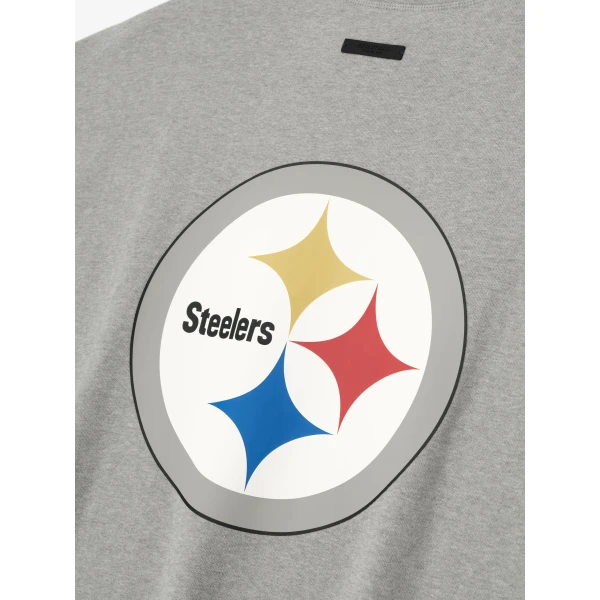 Fear of God Essentials Steelers 90s 3/4 Sleeve Football Tee in Concrete Heather | T-shirts & vests | Coveti