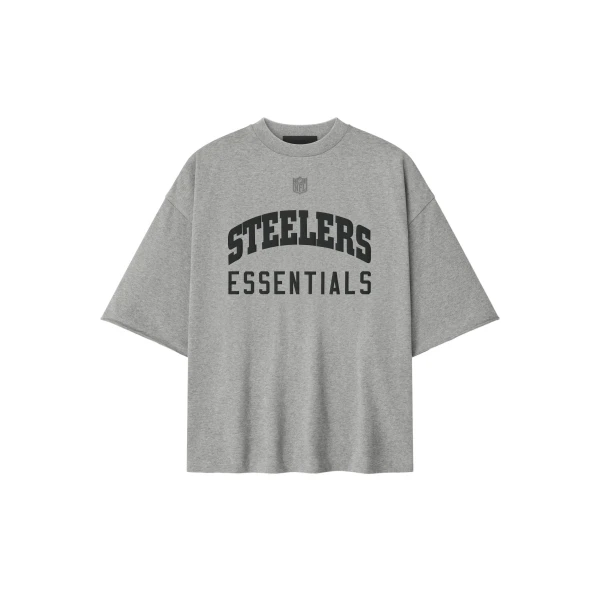 Fear of God Essentials Steelers 90s 3/4 Sleeve Football Tee in Concrete Heather | Coveti