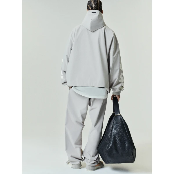 Fear of God Essentials Storm Pant in Seal | Pants | Coveti