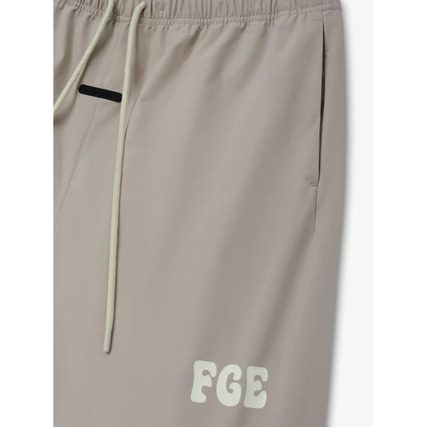 Fear of God Essentials Storm Pant in Seal | Pants | Coveti