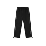 Fear of God Essentials Suede Fleece Signature Relaxed Pant in Vintage Black | Coveti