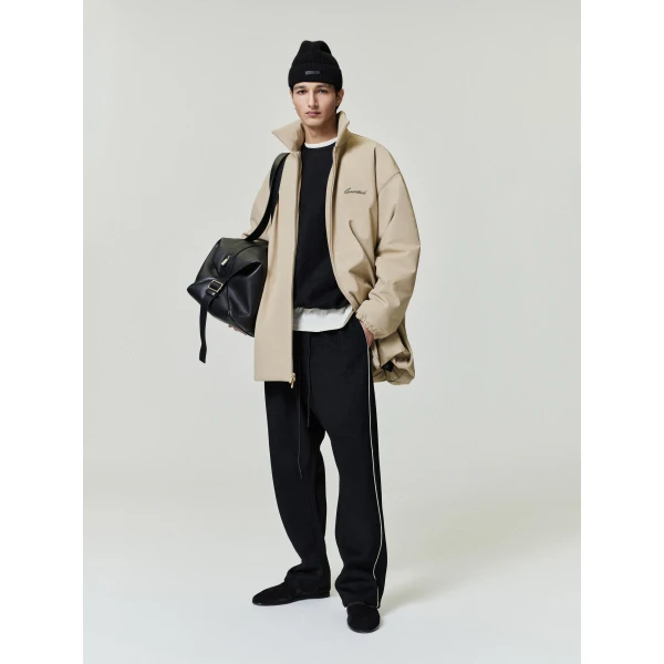 Fear of God Essentials Suede Fleece Signature Relaxed Pant in Vintage Black | Pants | Coveti