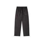Fear of God Essentials Suede Fleece Signature Relaxed Pant with Piping in Ink Black | Coveti
