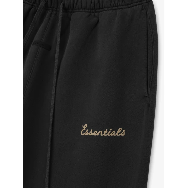 Fear of God Essentials Training Classic Flare Sweatpant in Faded Black | Pants | Coveti