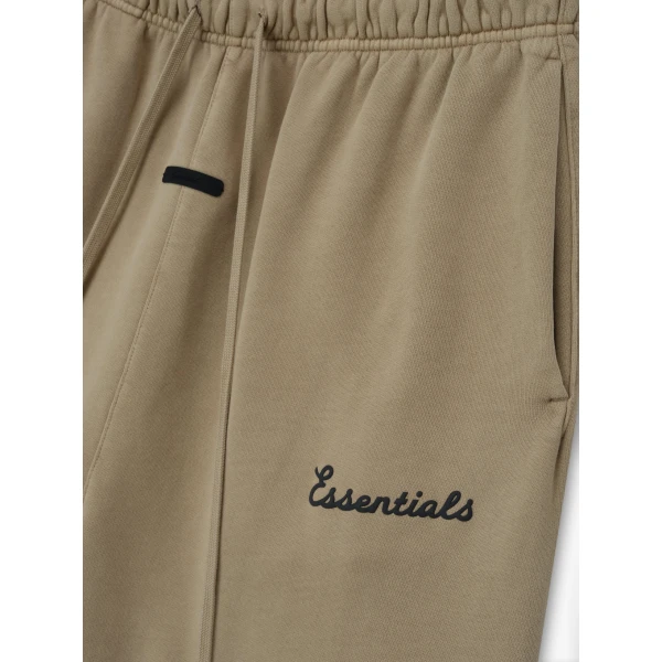 Fear of God Essentials Training Classic Flare Sweatpant in Faded Dune | Pants | Coveti