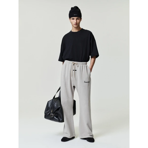Fear of God Essentials Training Classic Flare Sweatpant in Faded Seal | Pants | Coveti