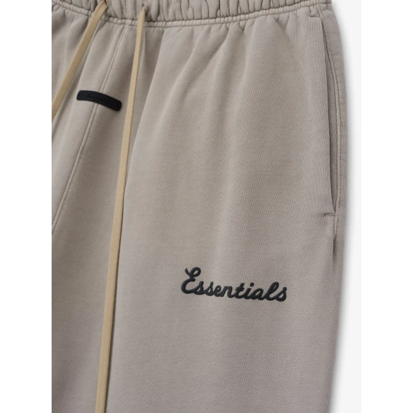 Fear of God Essentials Training Classic Flare Sweatpant in Faded Seal | Pants | Coveti