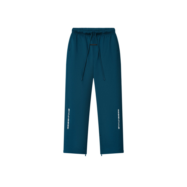 Fear of God Essentials Tricot Classic Trackpant in Night Sea | Coveti