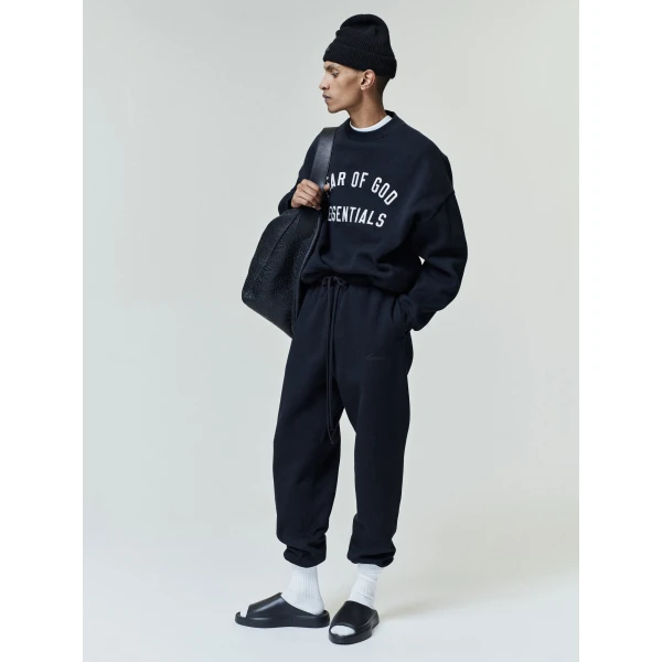 Fear of God Essentials Varsity 90s Crewneck Sweatshirt in Vintage Black | Sweatshirts | Coveti