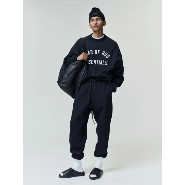 Fear of God Essentials Varsity 90s Crewneck Sweatshirt in Vintage Black | Sweatshirts | Coveti