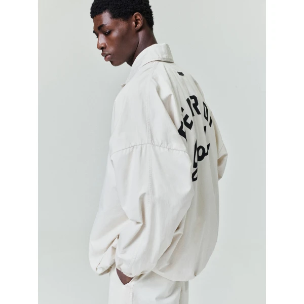 Fear of God Garment Dyed Cotton Windbreaker in Natural | Men Jackets | Coveti