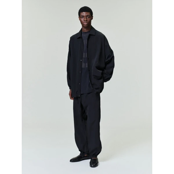 Fear of God Nylon Ripstop Tech Track Pants in Black | Pants | Coveti