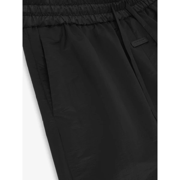 Fear of God Nylon Taffeta Padded Sport Short in Off Black | Shorts | Coveti