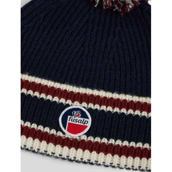 Fusalp Pompon Beanie in Navy, Racing Red and Snow, view 5 | Hats | Coveti