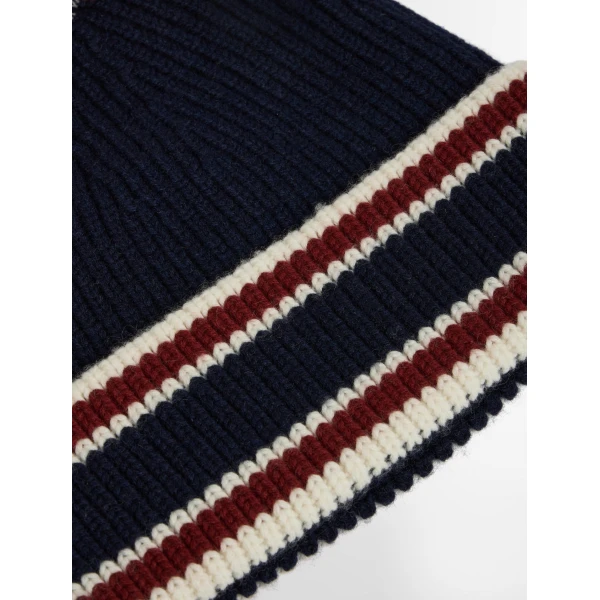 Fusalp Pompon Beanie in Navy, Racing Red and Snow, view 6 | Hats | Coveti